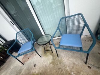 Outdoor Patio Set: 2 chairs,  2 seat cushions, and 1 round table