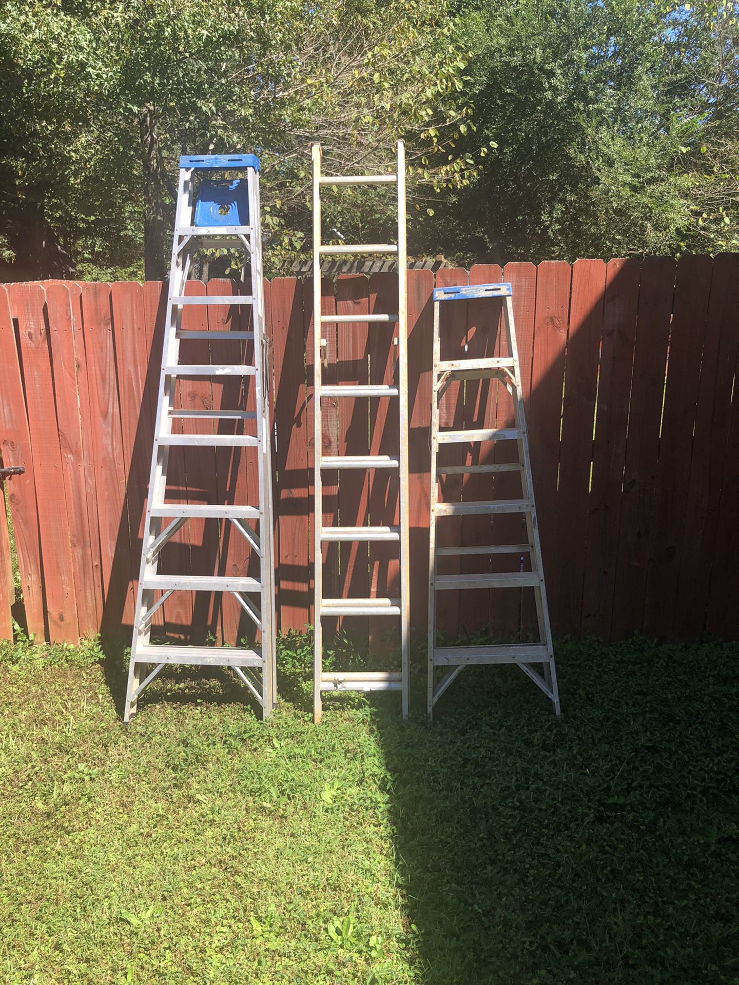 Three  Aluminum Ladders