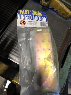 Fall protection harnesses and tie off point