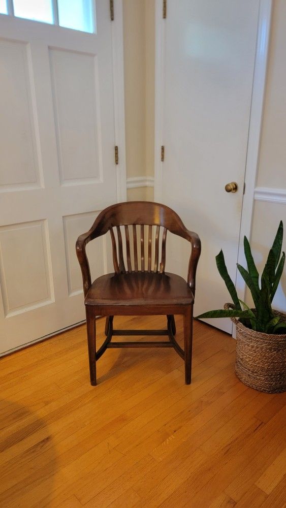 Vintage red oak bankers chair