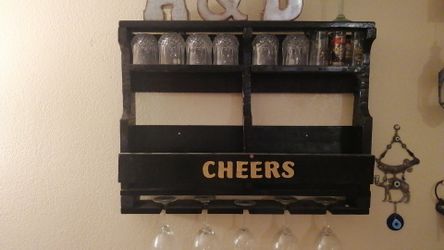 Hand made antique bottle /glass holder.