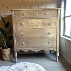 Newly refinished tall boy vintage dresser