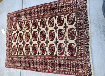 Unique hand made 100 percent wool vintage Persian Turkmen Accent Rug or area rug. 4 x 5. 