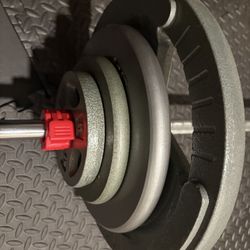 BRAND NEW Standard: 6 ft Steel Barbell with pairs of 45s 25s 10s and 5s. Total: 190 lbs