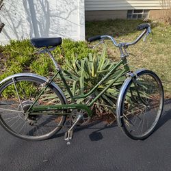 Vintage women's Schwinn Collegiate green bike