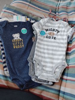 Carter's/ Child of mine - 8 New onesies size 6-9 months