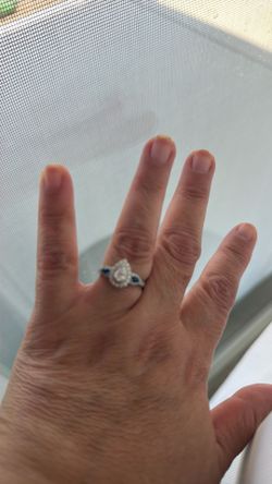 White gold, diamond and sapphire engagement ring