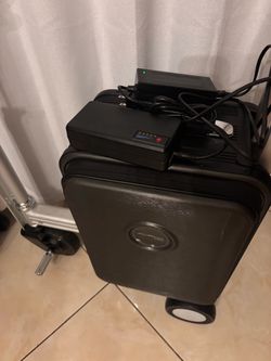Carry on suitcase electric