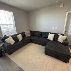 Right facing 4 piece sleeper sectional couch