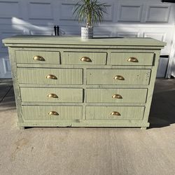 Rustic sage green dresser with gold pulls