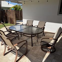 Woodard cayman isle sling patio table and chairs
