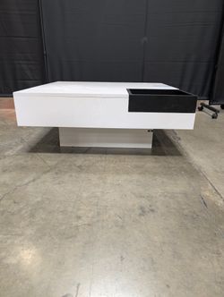 Contemporary High-Gloss White Coffee Table with Black Recessed Compartment