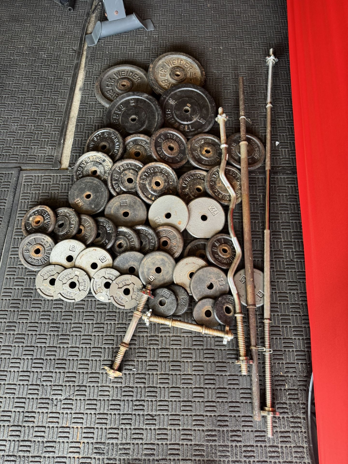 Standard weights 325lbs total plus 6ft bar and curl bar plus dumbbells handles