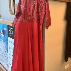 WOMENS LONG RED DRESS IN AN XXL SIZE WITH SEQUINED TOP AND SLEEVES BRAND NEW AND GOING CHEAP