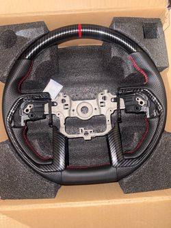 Carbon Fiber Steering Wheel with red stitching for Tacoma (2024+) /Tundra (2022+) / 4Runner (2025)