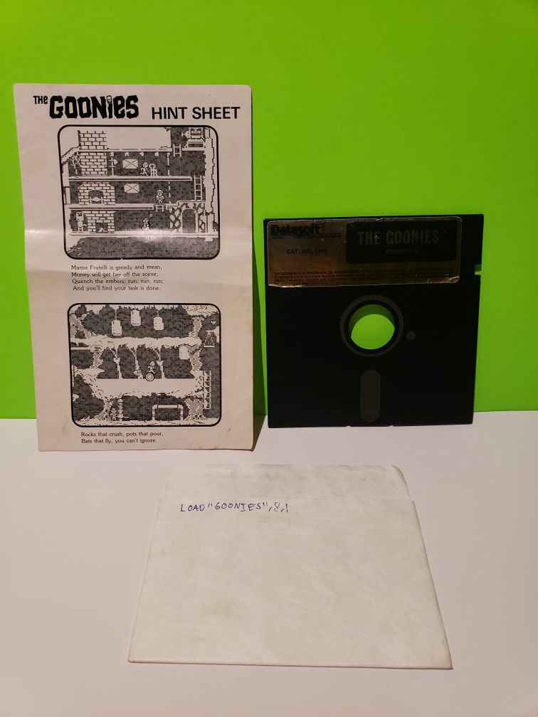 Commodore 64 RARE Goonies Floppy Disk w/ Hint Book
