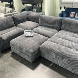 New 5 Piece Corduroy Sectional.  Grey.  90”x127”x66”.  Free Delivery!