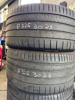(2) 23” Pirelli 325/30zr23 used pair good tires like new