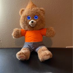 Teddy Ruxpin doll.