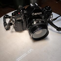 Canon A1 Vintage Camera And Accessories 