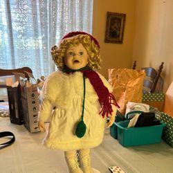 Ice Skating Porcelain Doll.  For Display Only. On Stand.