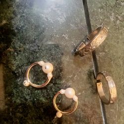 $2.00       SPECIAL: TWO SETS OF GOLD TONE RINGS 