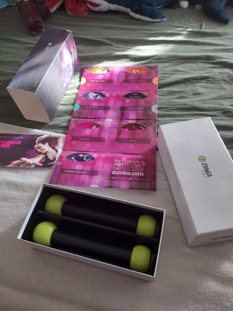 Zumba fitness exhilarate Body Shaping System with Toning Sticks.