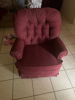 Swivel rocking arm chair