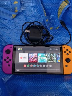 Nintendo Switch with Purple and Orange Joy-Cons