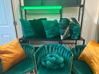 Three Green chairs with gold legs