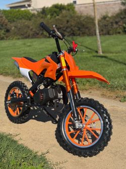 orange Kids Dirt bike 2 stroke mini teen adult pocket bike