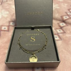 Gold Lussoro bracelet with S charm