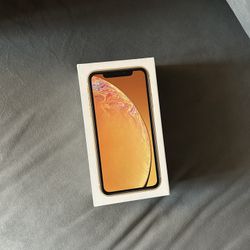 Apple iPhone XR - 64GB UNLOCKED RARE COLOR WITH OTTER BOX AND AN EXTRA CHORD