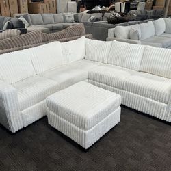White Ivory Sectional And Ottoman 