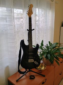 Used guitar for sale in excellent condition. (Without stand) $80