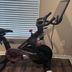PELOTON BIKE WITH WEIGHTS 