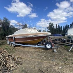 Boat And Trailer With Pink slips