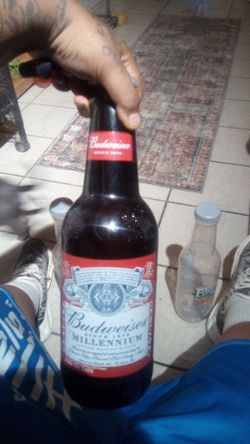 Very good condition but used classic collectables the budwizer bottle is glass and the other two are plastic bottles