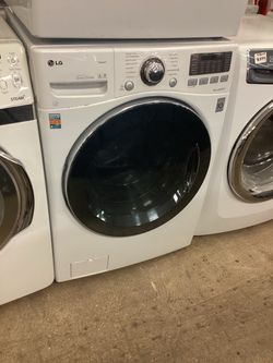 LG High Efficiency 4 cu.ft. Front Load Washer and 7.4 cu.ft. Front Load Electric Dryer Stackable Set