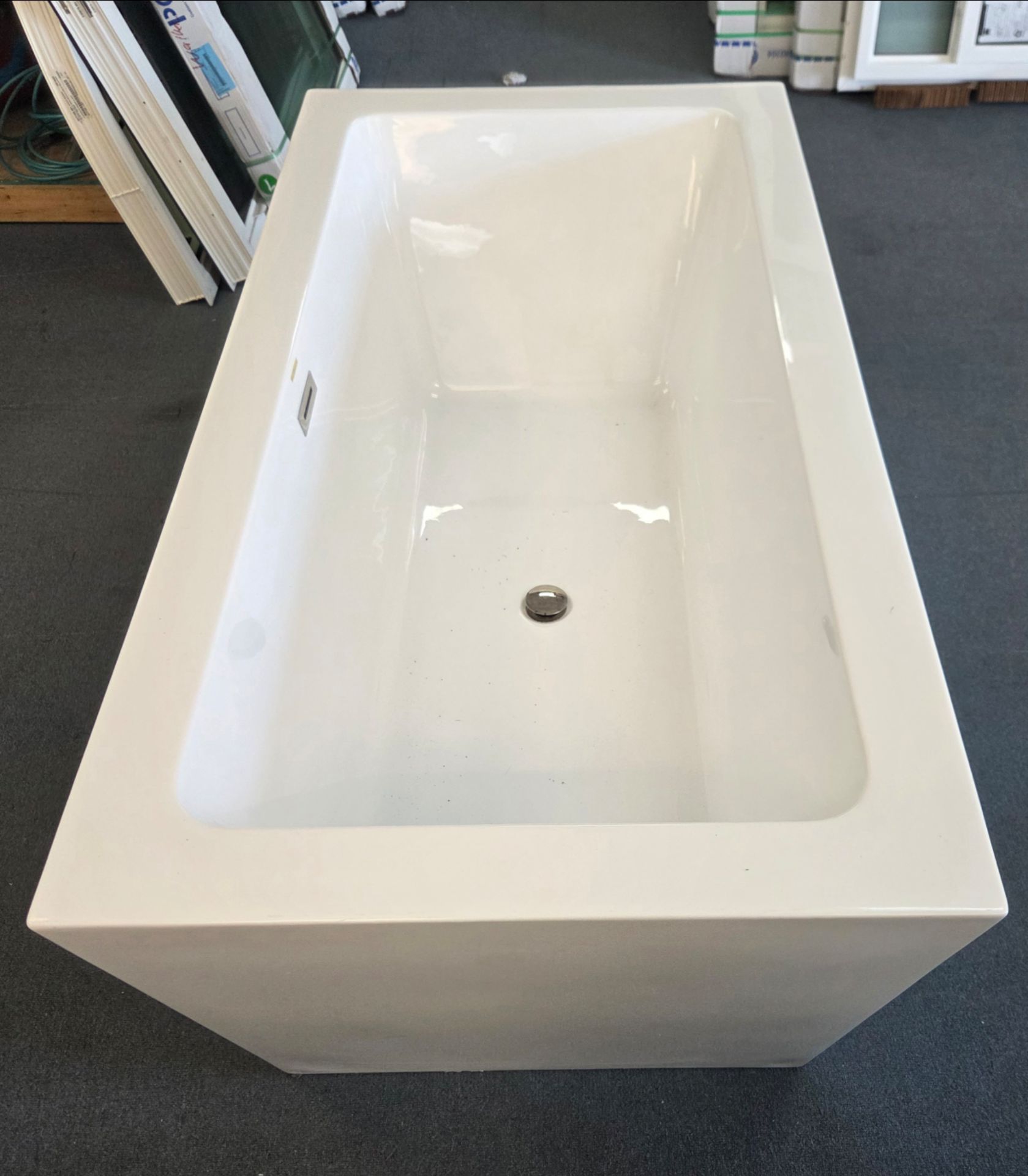 Brand New 67 x 34 inch Center Drain Foam Insulated Acrylic Freestanding Bathtub