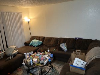 Large brown sectional with ottoman
