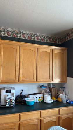 All kitchen cabinets including stove top