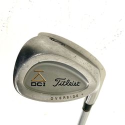 Titleist DCI Oversize+ iron, a classic game-improvement model first released around 1996. It features a stainless steel cavity back design with perime