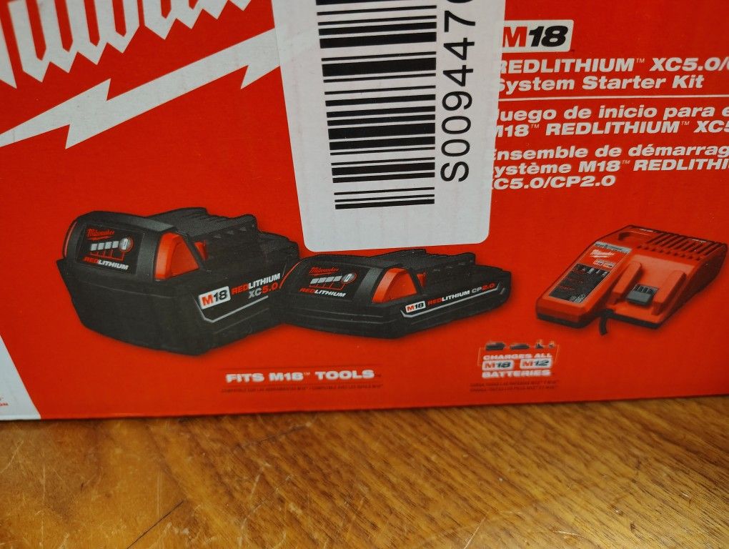 Milwaukee 5.0ah And 2.0ah Batteries And Charger