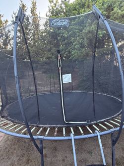 Large skybound trampoline with safety net