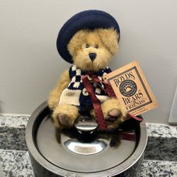 Caitlin Berriweathery from the Boyds Bears Archive Collection, making her a collectible item.  She was also offered as a 