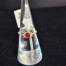 Ladies Ring Red Stone With Diamond Chip Size 6