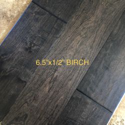 Birch Distressed Engineered Wood . Extra Wide 6.5” Plank Size With A Durable 1/2” Thick Multi Layer Construction . UV Cured Finish . 