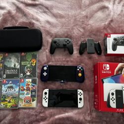 A Great Condition OLED Model-WITH Games, Pro Controller And More- 64GB - White