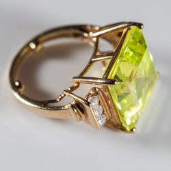 Gold ring with large Peridot and Diamonds